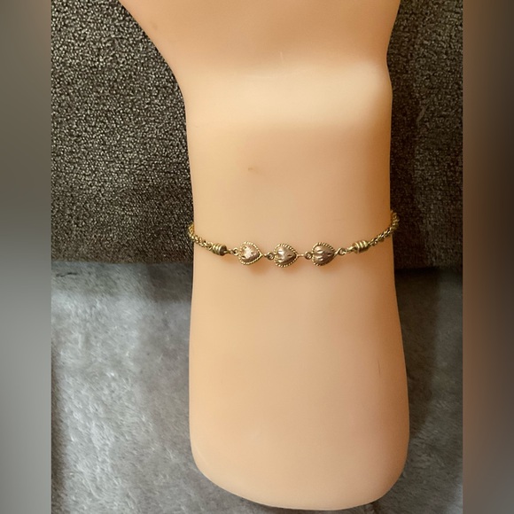 Beverly Hills Gold: 14k.Puffy triple heart rose gold, yellow gold rope bracelet. - Picture 8 of 10
